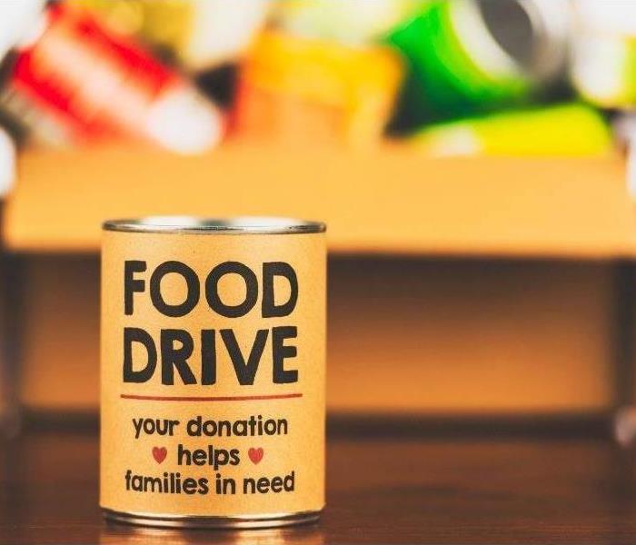 Yellow can with "Food Drive" written on it